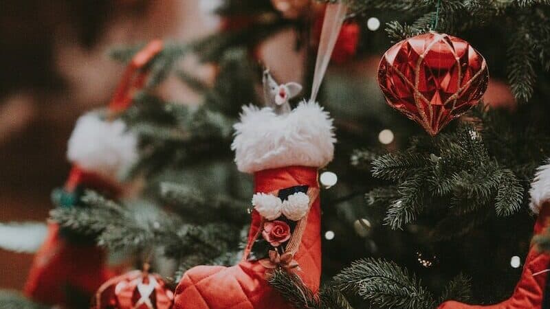 pre-lit Christmas tree with assorted Christmas tree ornaments